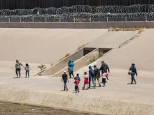 May 30, 2019: Migrants from Central America cross the U.S.-Mexico border at El Paso, Texas / Ciudad Juarez, Chihuahua, Mexico to seek asylum in the United States.